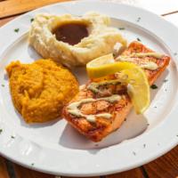 Farmed Atlantic Salmon · Seasoned and flame grilled finished with a lemon Dijon sauce with a touch of garlic and tarr...