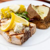 Grilled Swordfish · 10 oz. fresh hand-cut grilled swordfish topped with garlic butter. May also be prepared Caju...