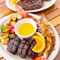 Surf and Turf · Served with potato and vegetable.