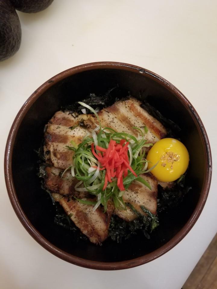 D1. Chasyu-Don · 6 slices of pork belly over rice topped with seaweed, scallion and ginger pickles served with raw egg on the side with tofu miso soup.