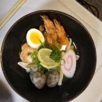 7. Nagasaki Jjampong · Pork broth, squid, clam, shrimp, salt flavored egg, naruto, bean sprout, scallion and lemon.