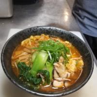 V2. Vegetable Tan-Tan Ramen · Spicy soybean flavored broth with scallion, bamboo shoots, bean sprouts, broccoli, corn and ...