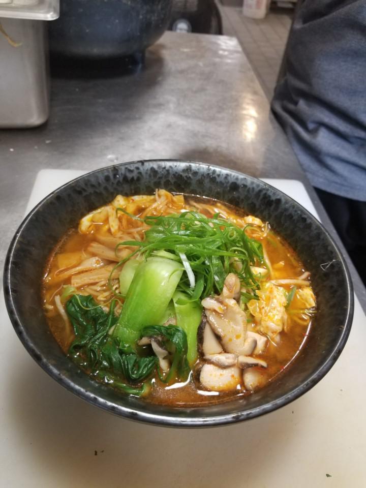 V2. Vegetable Tan-Tan Ramen · Spicy soybean flavored broth with scallion, bamboo shoots, bean sprouts, broccoli, corn and noodles. 