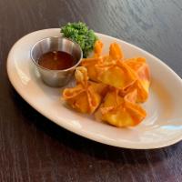 Crab Rangoon · 5 pieces. Imitation crabmeat, cream cheese and celery wrapped in crispy wonton skin.