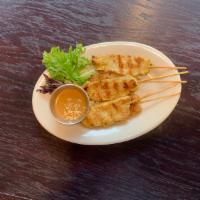 Chicken Satay · 5 pieces. Marinated chicken skewed served with peanut dipping sauce and cucumber salad.