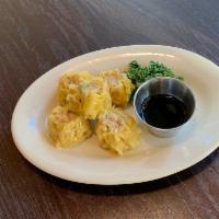 Chicken and Shrimp Dumplings · 5 pieces. Chicken and shrimp, carrot, water chestnut and scallion and spicy soy sauce. Serve...