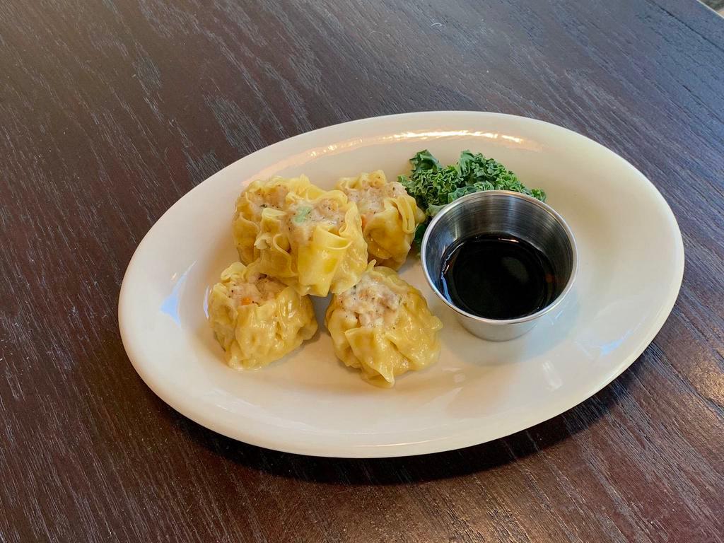 Chicken and Shrimp Dumplings · 5 pieces. Chicken and shrimp, carrot, water chestnut and scallion and spicy soy sauce. Served steamed or fried.