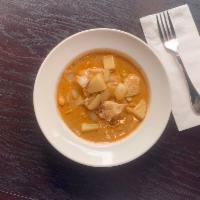 Massaman Curry · Potato, onion and peanut in coconut cream mild spicy.