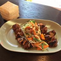 Thai BBQ chicken · Grilled Chicken Boneless served with sticky rice and papaya salad 