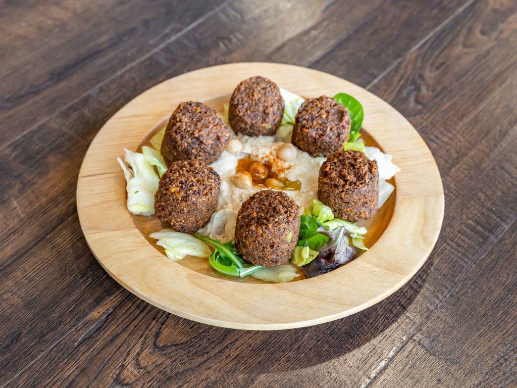 Falafel · Croquette of chickpeas with celery, garlic, parsley, cilantro, onions with tahini.