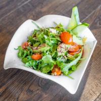Istanbul Salad · Fresh baby arugula, mixed with avocado, tomatoes, feta cheese, dressed with olive oil and or...