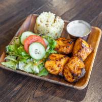 Chicken Shish Kebab · Tenderzed breast of chicken marinated in our secret and grilled on char-grill, served with r...