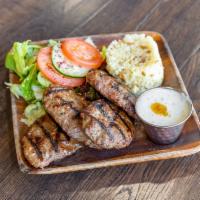 Kofte Kebab · Patties of freshly ground beef and lamb slightly seasoned and cookeed on our char-grill, ser...