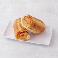 Meatball Parmigiana Sub · Sandwich with seasoned meat that has been rolled into a ball topped with tomato sauce and ch...