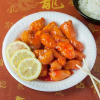 140. Sweet and Sour Chicken · Served with white rice.