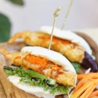 Ebi Tempura Bun · Steamed buns, fried shrimp tempura, mixed green, cucumber, scallion, seafood mayo sauce, ter...