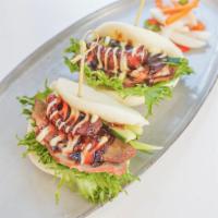 BBQ Roasted Pork Bun · BBQ Roasted Pork, Chinese Sausage, Green Lettuce, Scallion, Cucumber, Topped with Hoysin, Ma...
