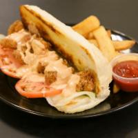 Shrimp Po' Boy Sandwich · Fried shrimp, lettuce and tomato on bun. Served with fries.