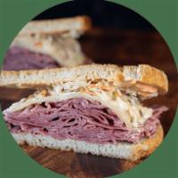 Corned Beef Special · Corned beef, Swiss cheese topped with coleslaw and Russian dressing.