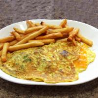 3 Cheese Omelette · American, Swiss and mozzarella cheese.