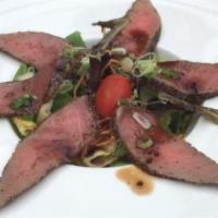 Black Pepper Tuna Salad · Seared black pepper tuna and spring mix with spicy Japanese vinegar sauce.