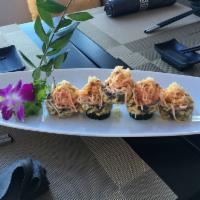 Volcano Roll · Deep-fried white tuna, avocado and tobiko with spicy crunch crab meat on the top
