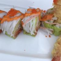 Angry Dragon Roll · Shrimp tempura, spicy tuna and papaya topped with spicy crab meat wrapped in soy bean paper.