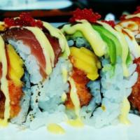 Luna Roll · Spicy crunchy salmon and mango topped with blackened tuna, sweet shrimp, eel, avocado and to...