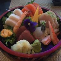 Chirashi · 13 assorted raw fish, egg and pickles over rice. Served with soup or salad. 