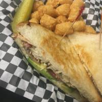 TBA · Grilled turkey, bacon and avocado on choice of bread.