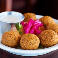 Falafel Appetizer · falafel patties (chickpea/fava bean croquettes)
served with lettuce, tomatoes, pickled turn...
