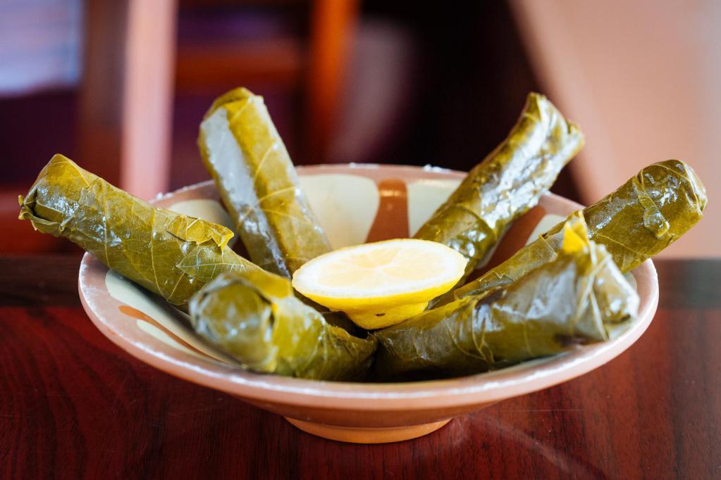 6 pc. Grape Leaves · rolled grape leaves with rice, parsley, onions and spices. 							