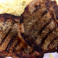2 Center Cut Pork Chops Dinner Plate · Served with salad, garlic bread and choice of french fries or rice.