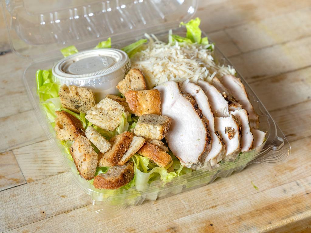 Grilled Chicken Caesar Salad · Grilled chicken, romaine, croutons and Parmesan. Served with Caesar dressing on the side. 