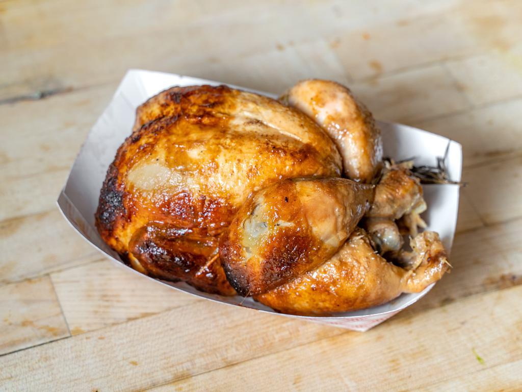 Half Rotisserie Chicken · Fire-roasted over simmering water that ensures a moist and tender bird! All birds are local and hormone-free.