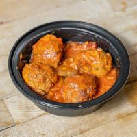 Lamb Meatballs · With feta cheese, Kalamata olives and red pepper sauce.