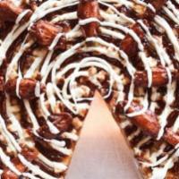 BBQ Chicken Pizza · Grilled chicken topped with mozzarella cheese, BBQ sauce and ranch dressing.