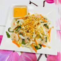 S2. Papaya Salad · Served with poached shrimp, green papaya, basil, pickled jicama, daikon, and carrots. Topped...