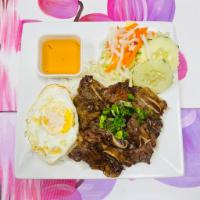 C3. Grilled Beef Short Ribs And Egg · Served w/ Jasmine Rice, lettuce, cucumber, pickled daikon and carrots. Topped with green oni...