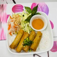 B1. Fried Egg Rolls Bowl · Fried egg rolls.  Served with rice noodles, bean sprouts, cucumber, basil, lettuce, pickled ...