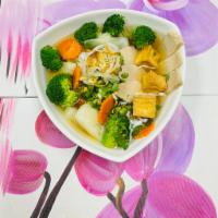 V11. Combination Noodle Soup Vegetarian · Served w/ cabbage, broccoli, carrot.
Tofu, veggie ham, veggie chicken
100% Vegetarians