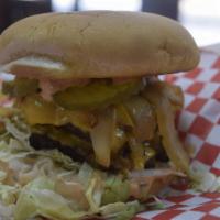 double Ederville Grill Burger · Lettuce,  pickles,  grilled onions,  with amazing special sauce , American cheese on a butte...