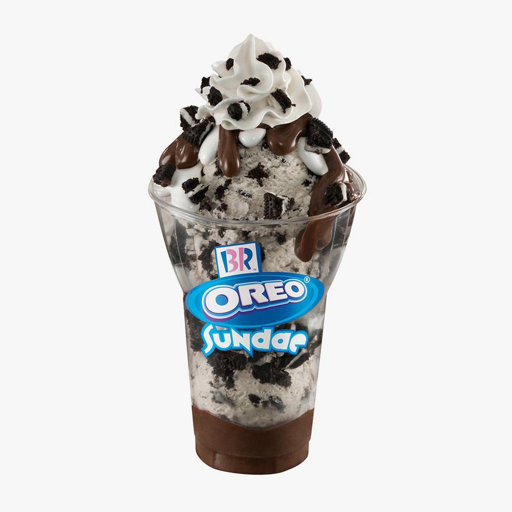 Oreo Layered Sundae · 3 scoops of our Oreo cookies 'n cream ice cream layered with hot fudge and chopped Oreo cookie pieces topped with marshmallow, more hot fudge and Oreo cookie pieces.