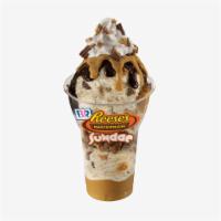 Reese's Peanut Butter Cup Sundae · 3 scoops of Reese's peanut butter cup ice cream topped with layers of Reese's peanut butter ...