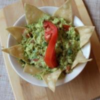 Guacamole · Fresh avocado and pico de gallo with seasoning. Served with corn tortilla chips.