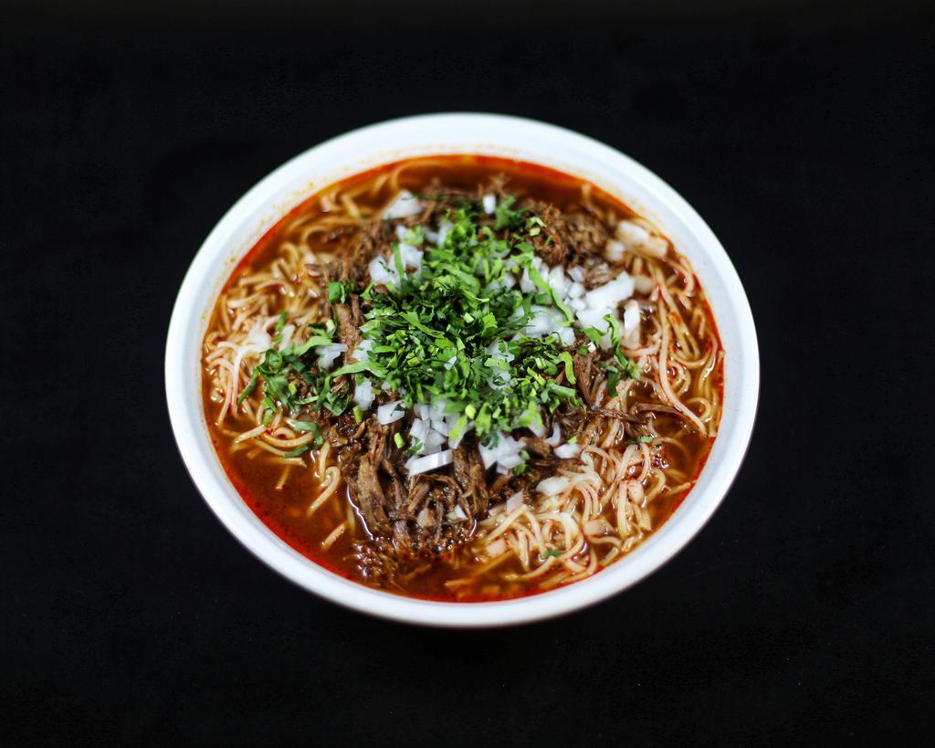 Short Rib Birria Ramen · Our Jalisco Style... Angus Short Ribs, simmered to perfection until it falls off the bone.  Our Birria ramen is topped with cilantro and onion.  A hearty meal on a cold day.  It comes with our  house made Chili de Arbol Birria Salsa on the side.