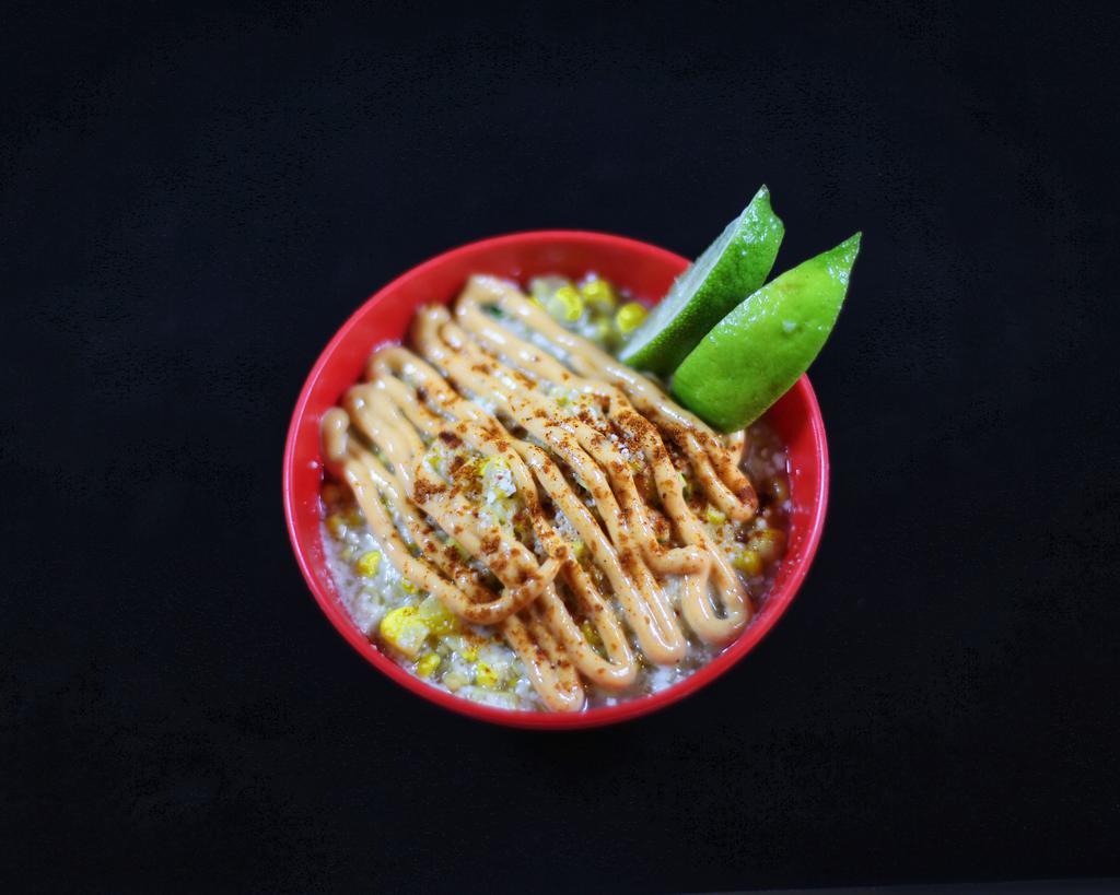 Esquites · Freshly shucked corn topped with Cotija Cheese, Chipotle Mayo, Chile Piquín and cilantro.  A Mexican street corn must have!