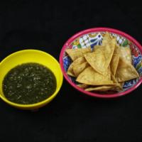 Nixtamal Corn Chips with Salsa Verde · 1 lb house made Nixtamal Corn Chips with our freshly made Salsa Verde.
