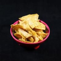 Nixtamal house made totopos (Chips) · One Lb of our house made Nixtamal Totopos. Made from our 100%
Nixtamal Corn.