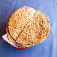 Papadum · A bean wafer and thin crispy Indian bread.